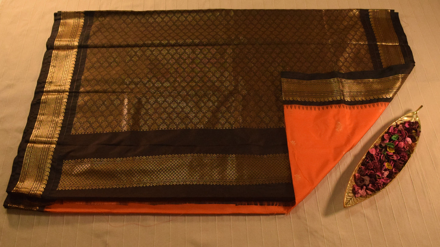 Vibrant orange and Black Semi Gadwal silk saree