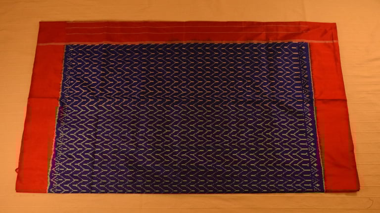 Striking blue and deep Red Pure handloom Pochampally Ikat Silk saree