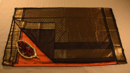 Vibrant orange and Black Semi Gadwal silk saree