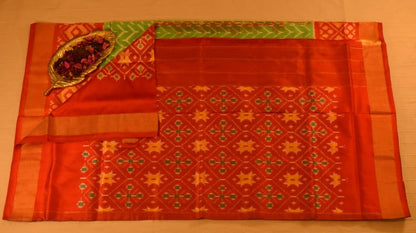 Lime Green and Vermillion Red Pure handloom Pochampally Ikat Silk saree